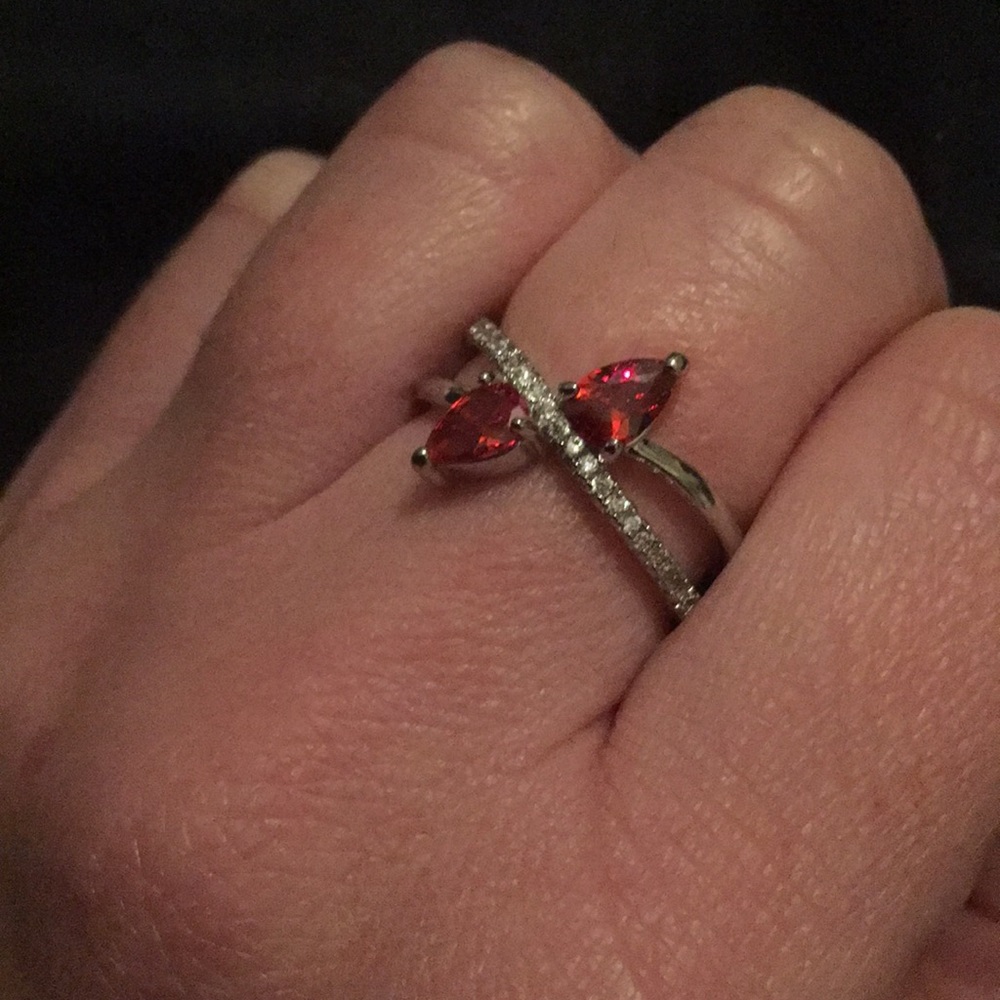 Brand new size 7 ring w/ red & white rhinestones!